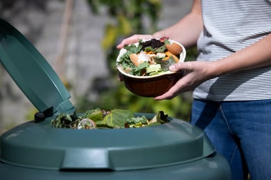 emptying-food-into-composter